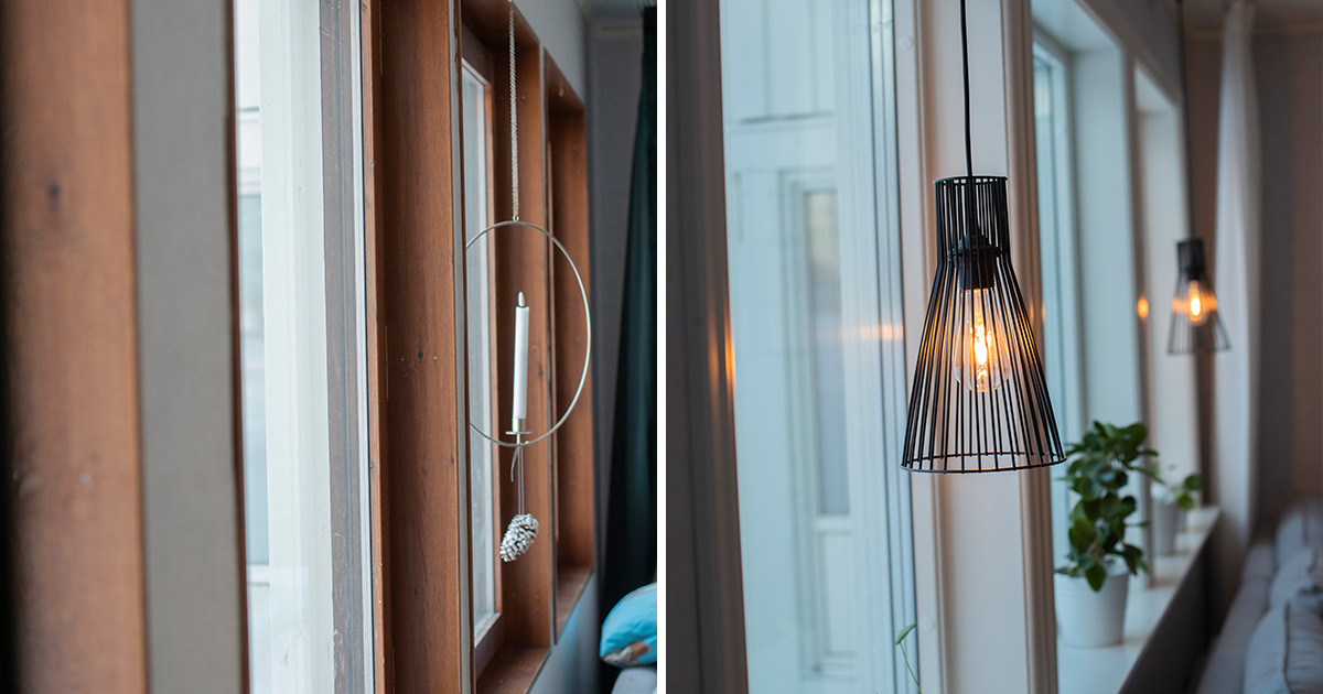 Detaljbild av fönster – äldre träfönster jämfört med moderna fönster med belysning.